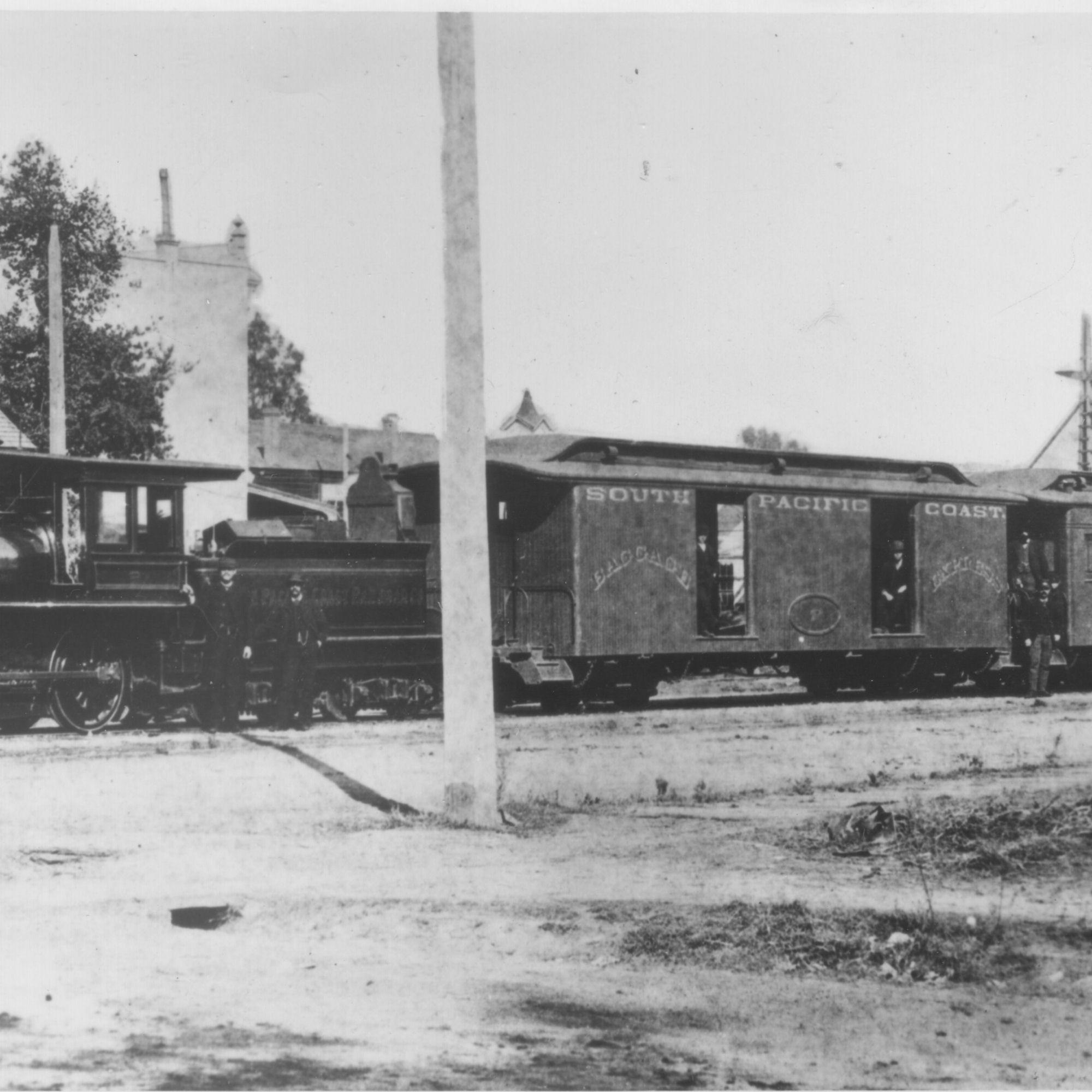 Loco 2 on Webster St at 12th Street Depot. Train is between 11th and 12th streets