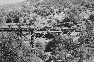 An ore train crossing Blacks Creek trestle