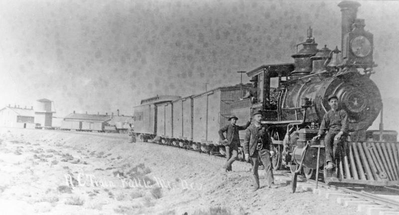 #1 and crew pose with their train at Battle Mountain, circa 1887.
