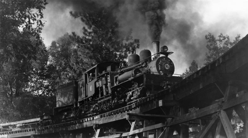 #6 on a low trestle, headed towards the woods in 1952.
